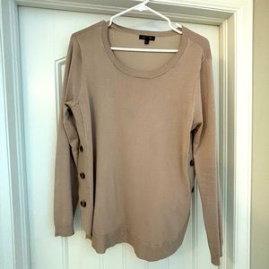 Sand color sweater with side buttons.